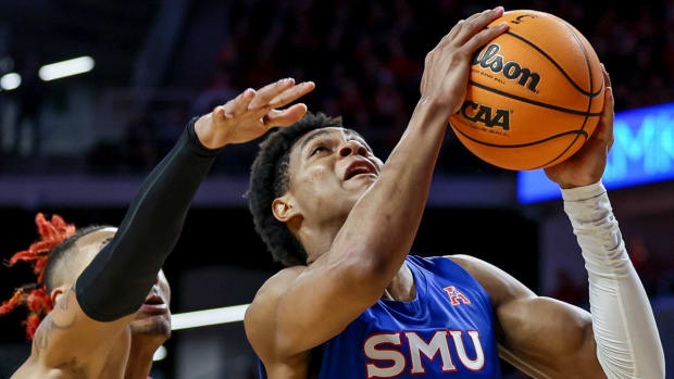 SMU's Zhuric Phelps drives to the basket against Cincinnati last March